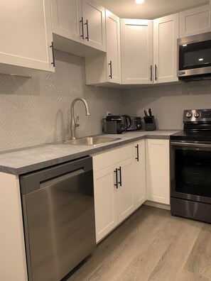 Fridge, microwave, oven, stovetop - This cozy studio apartment has an ideal location in the heart of downtown.  (St. John's)