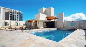 Outdoor pool, a heated pool - Waikiki Condo - 1BR, 2BA, Sleeps 6 (Honolulu)