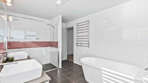 Shower, jetted bath, hair dryer, towels