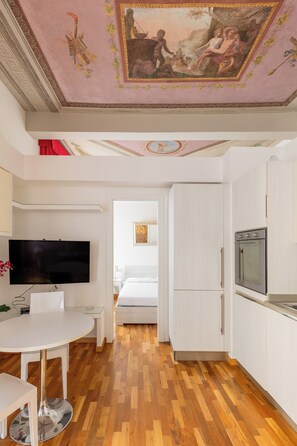 Apartment | Living area | 30-inch flat-screen TV with digital channels - La casa Magenta by Wonderful Italy (Bologna)