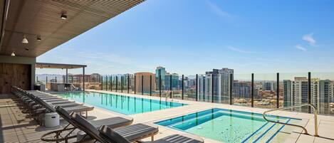Outdoor pool, open 6:00 AM to 11:00 PM, pool umbrellas, pool loungers
