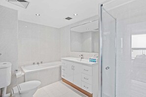 Shower, hair dryer, towels