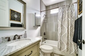Jetted bath, hair dryer, towels, soap