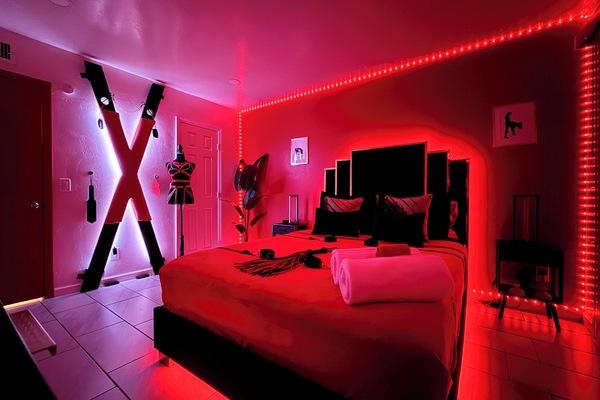 Your private fantasy escape--where luxury meets kink. St. Andrew's Cross, LED Vibes, and indulgence await.