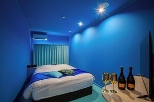 Economy Room | Down comforters, laptop workspace, blackout drapes, soundproofing