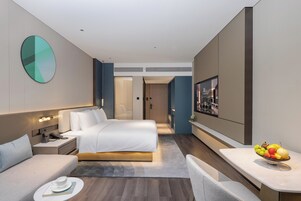 Senior Single Room, City View | Pillowtop beds, blackout drapes, free WiFi