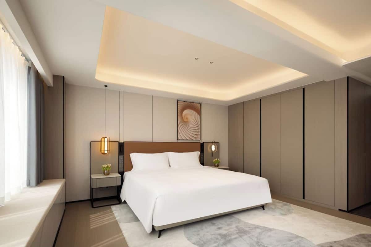 Premier Studio, City View | Living area | 65-cm LED TV with digital channels, toys