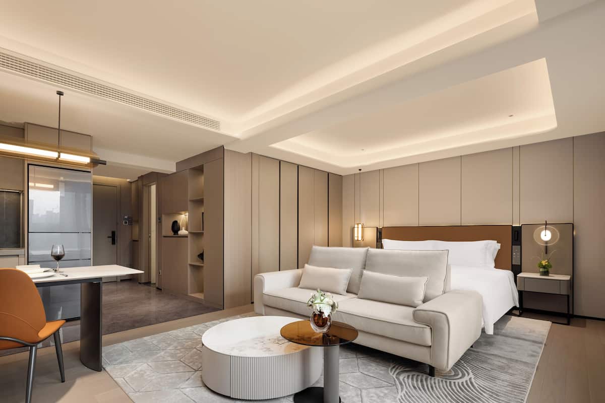 Executive Studio, City View | Living area | 65-cm LED TV with digital channels, toys