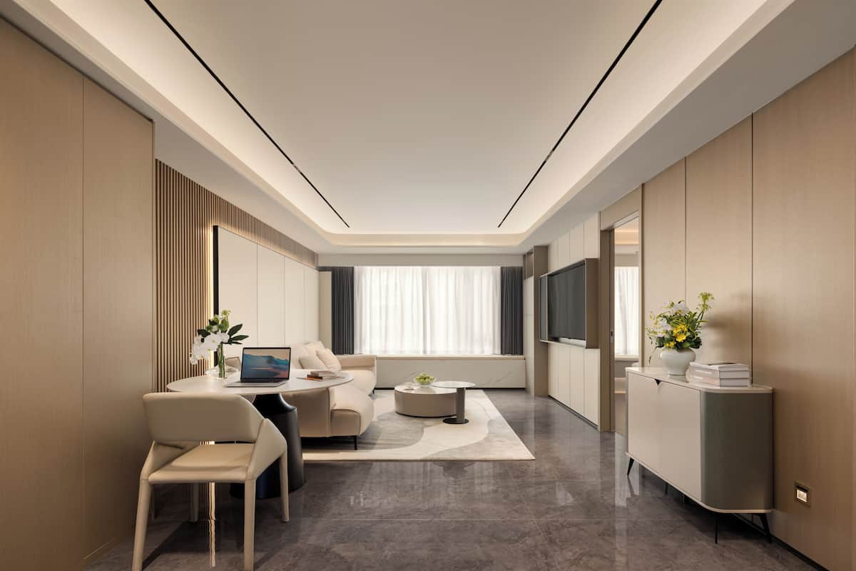 Executive Apartment, City View | Living area | 65-cm LED TV with digital channels, toys