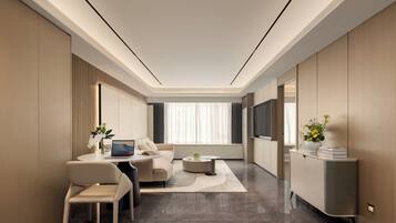 Căn hộ Executive, quang cảnh thành phố | Khu phòng khách | TV LED 65-cm có truyền hình kỹ thuật số, đồ chơi