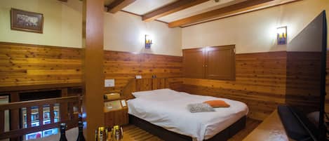 Chambre Simple, 1 très grand lit, fumeurs | Rideaux occultants, chambres insonorisées, Wi-Fi gratuit