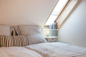 2 slaapkamers, een strijkplank/strijkijzer, gratis wifi, beddengoed