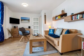 TV, mesa de pingue-pongue, aparelho de som