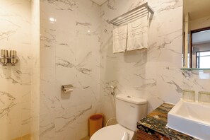 Shower, slippers, towels, soap