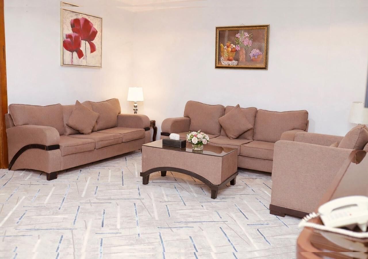 Two-Bedroom Deluxe Apartment | Living area | 40-inch Smart TV with cable channels