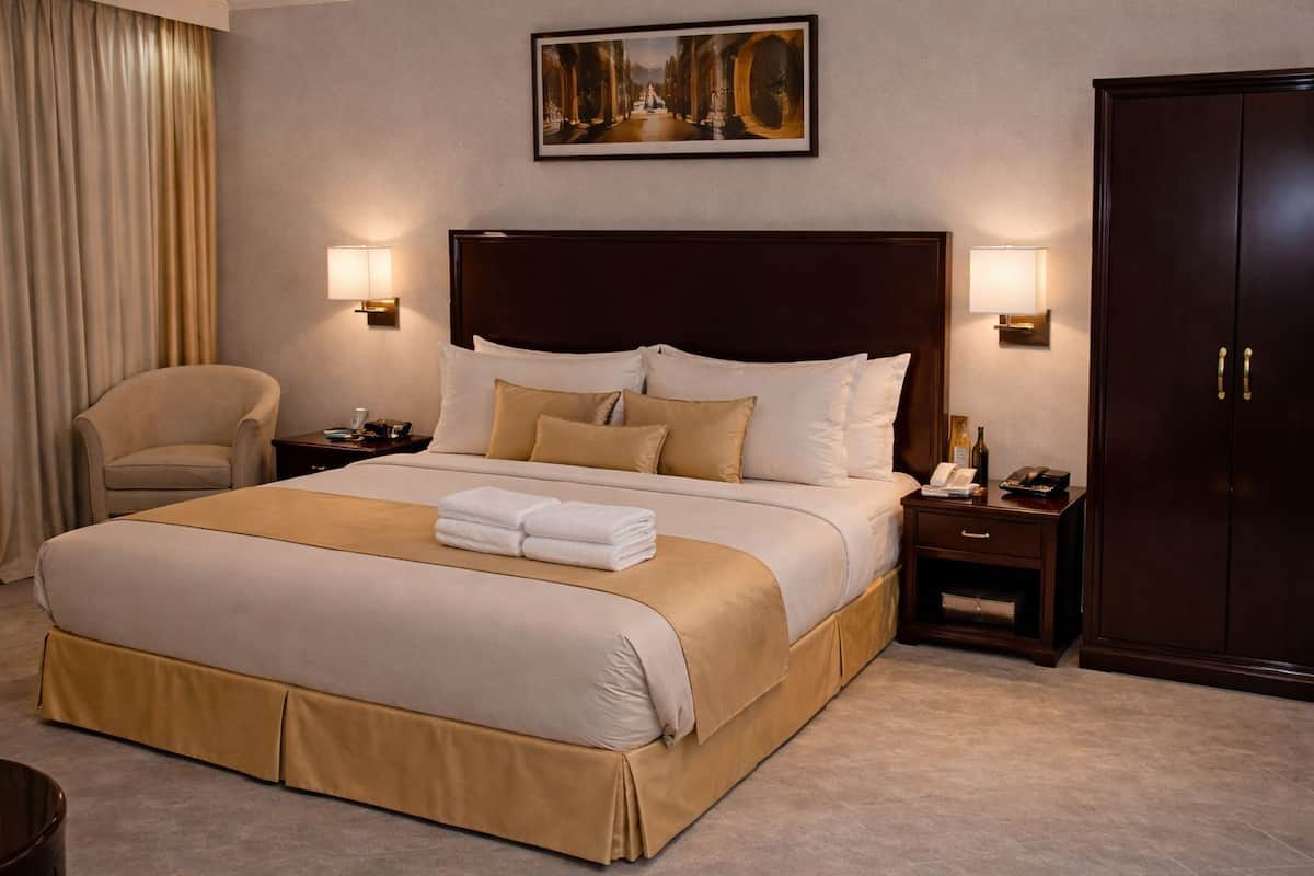 Economy Double Room | Minibar, blackout drapes, soundproofing, iron/ironing board