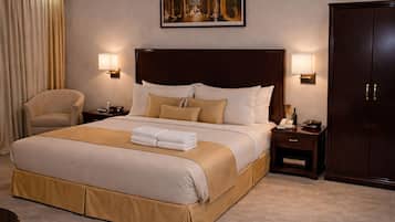 Economy Double Room | Minibar, blackout drapes, soundproofing, iron/ironing board