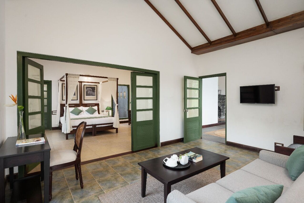 Deluxe Suite, Balcony, Garden View | Living area | 32-inch Smart TV with satellite channels