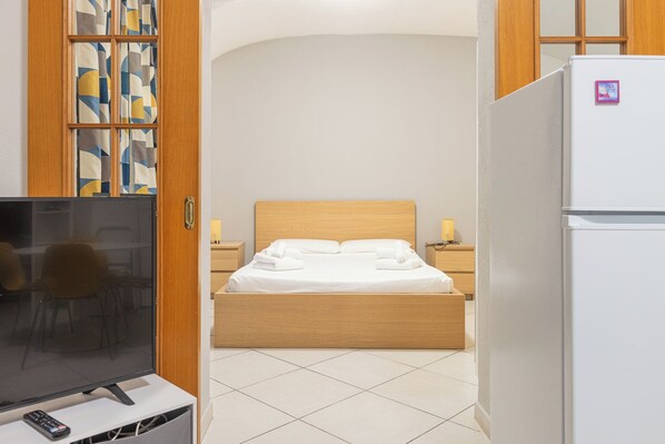 1 bedroom, iron/ironing board, WiFi, bed sheets - Accogliente Appartamento in Area Tranquilla a 10 Minuti di Metro dal Colosseo (Roma)