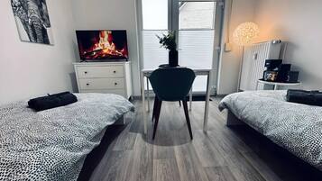 1 slaapkamer, een strijkplank/strijkijzer, wifi, beddengoed