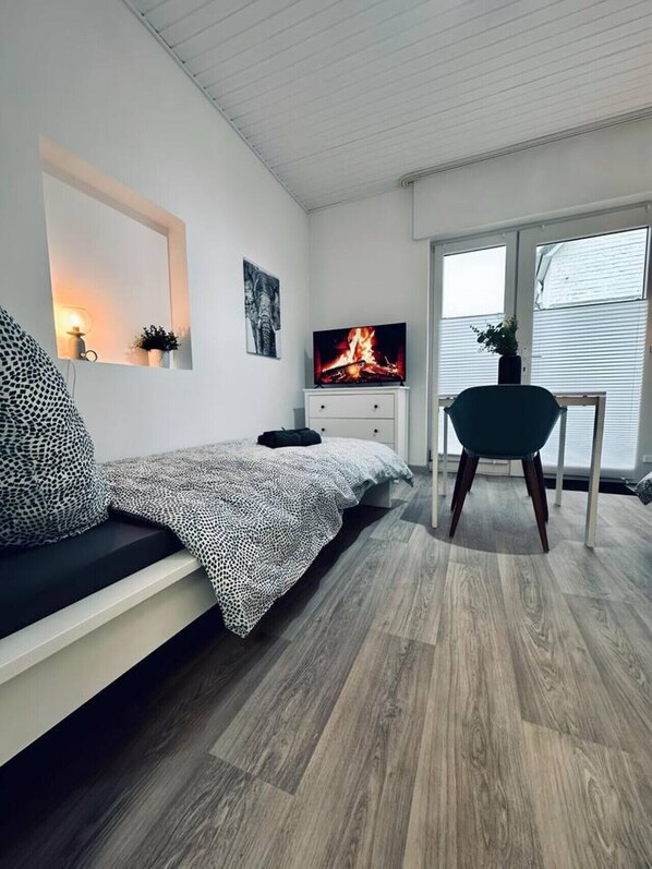 1 chambre, fer et planche Ă repasser, Wi-Fi, draps fournis