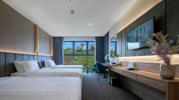 Superior-huone, 3 yhden hengen sänkyä, näköala mäelle (Garden) | Ylelliset vuodevaatteet, minibaari, tallelokero huoneessa, työpöytä