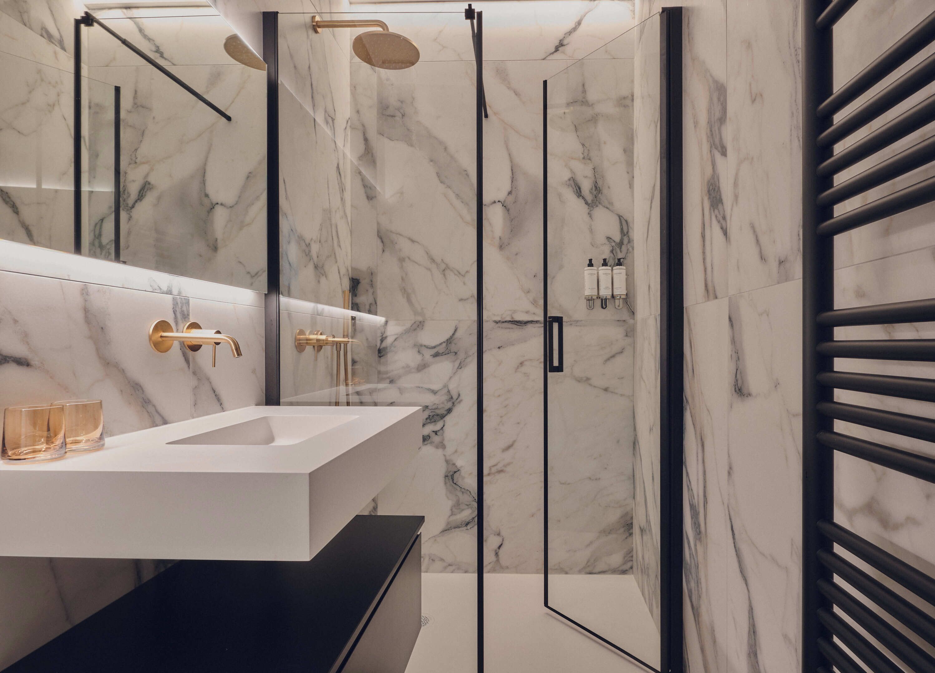 Shower, hair dryer, slippers, towels