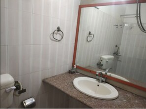 Shower, rainfall showerhead, towels, soap