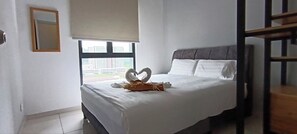 Deluxe appartement, uitzicht op de stad | 2 slaapkamers, een strijkplank/strijkijzer