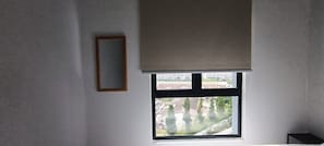 Departamento Deluxe, vista a la ciudad | Tabla de planchar con plancha