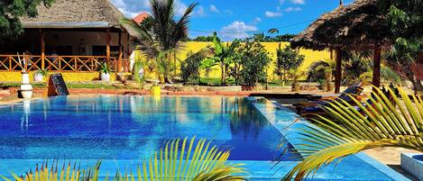 Outdoor pool, open 8:00 AM to 9:00 PM, pool umbrellas, pool loungers