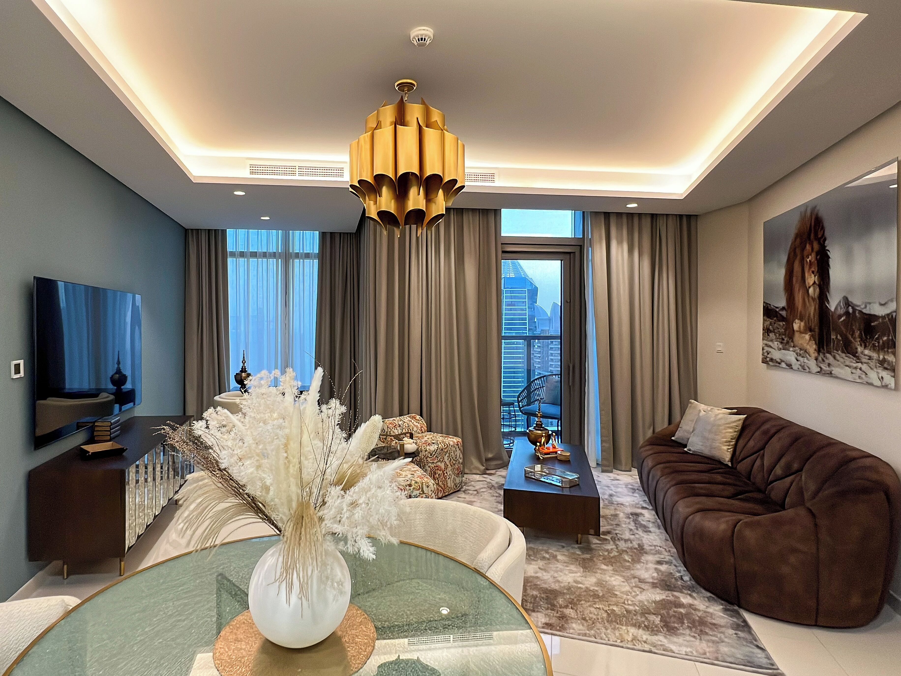 Deluxe Apartment, Balcony, City View | Living area | 50-inch Smart TV with digital channels