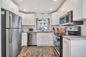 Fridge, microwave, oven, stovetop - Bliss by the Sea - Cozy Beachside Escape (Clinton)