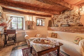 Family House, Multiple Bedrooms (Rustic House Luin) | Living area | 21-inch flat-screen TV with cable channels, TV, fireplace - Rustic House Luin (Komen)