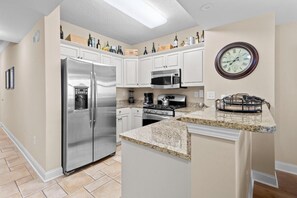 Fridge, microwave, oven, stovetop - Sunset Dreamscape Serenade: 2BR Condo by the Sea (North Myrtle Beach)
