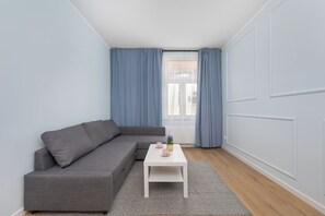 Apartment, 2 Bedrooms, Kitchen | Living area | 55-inch Smart TV with satellite channels - Światowida Apartment for 4 by Renters (Miedzyzdroje)