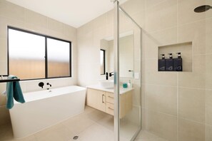 Shower, hair dryer, soap, shampoo