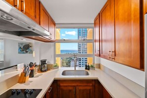 Fridge, microwave, stovetop, coffee/tea maker
