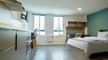 Estudio Deluxe | Cortinas opacas, tabla de planchar con plancha, wifi gratis