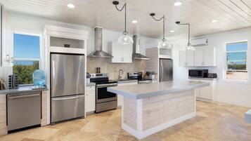 Villa | Private kitchen | Full-size fridge, microwave, oven, stovetop