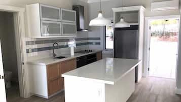 Villa | Private kitchen | Full-sized fridge, microwave, oven, stovetop