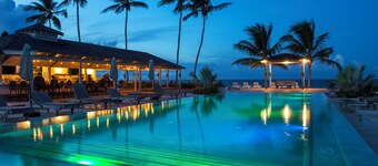 ทรอปิคอล เอสเคป: คอทเทจสวยงามพร้อมสิทธิพิเศษในรีสอร์ท