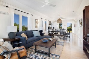 Villa | Living area | 32-inch LCD TV with satellite channels - Oceanfront Hideaway: Luxurious Retreat With Stunning Views (Governor's Harbour)