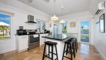 Villa | Private kitchen | Full-sized fridge, microwave, oven, stovetop