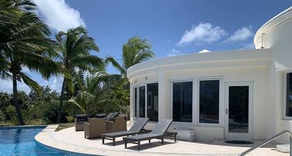 Exquisite Retreat: Contemporary Estate On Pink Sand Beach