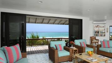 Villa | Living area | 32-inch LCD TV with satellite channels