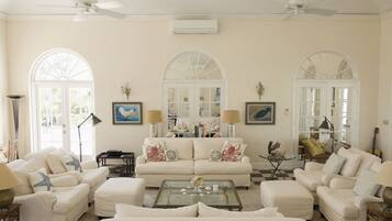 Villa | Living area | 32-inch LCD TV with satellite channels