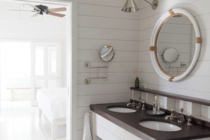 Villa | Bathroom | Shower, hair dryer, towels, toilet paper - Beachfront Bliss: Luxury Dunmore Town Home With Pool (Dunmore Town)