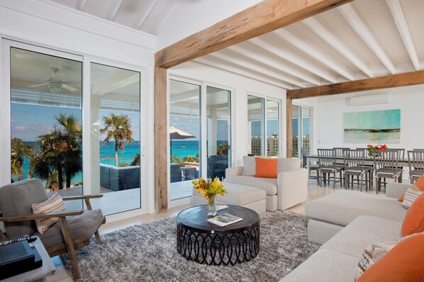 Villa | Living area - Touch Of Class Cottage: Beachfront Oasis (Savannah Sound)