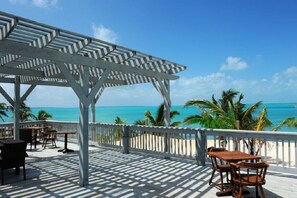 Villa | Terrace/patio - Seaside Escape: Private Beachfront Villa With Infinity Pool (Rock Sound)